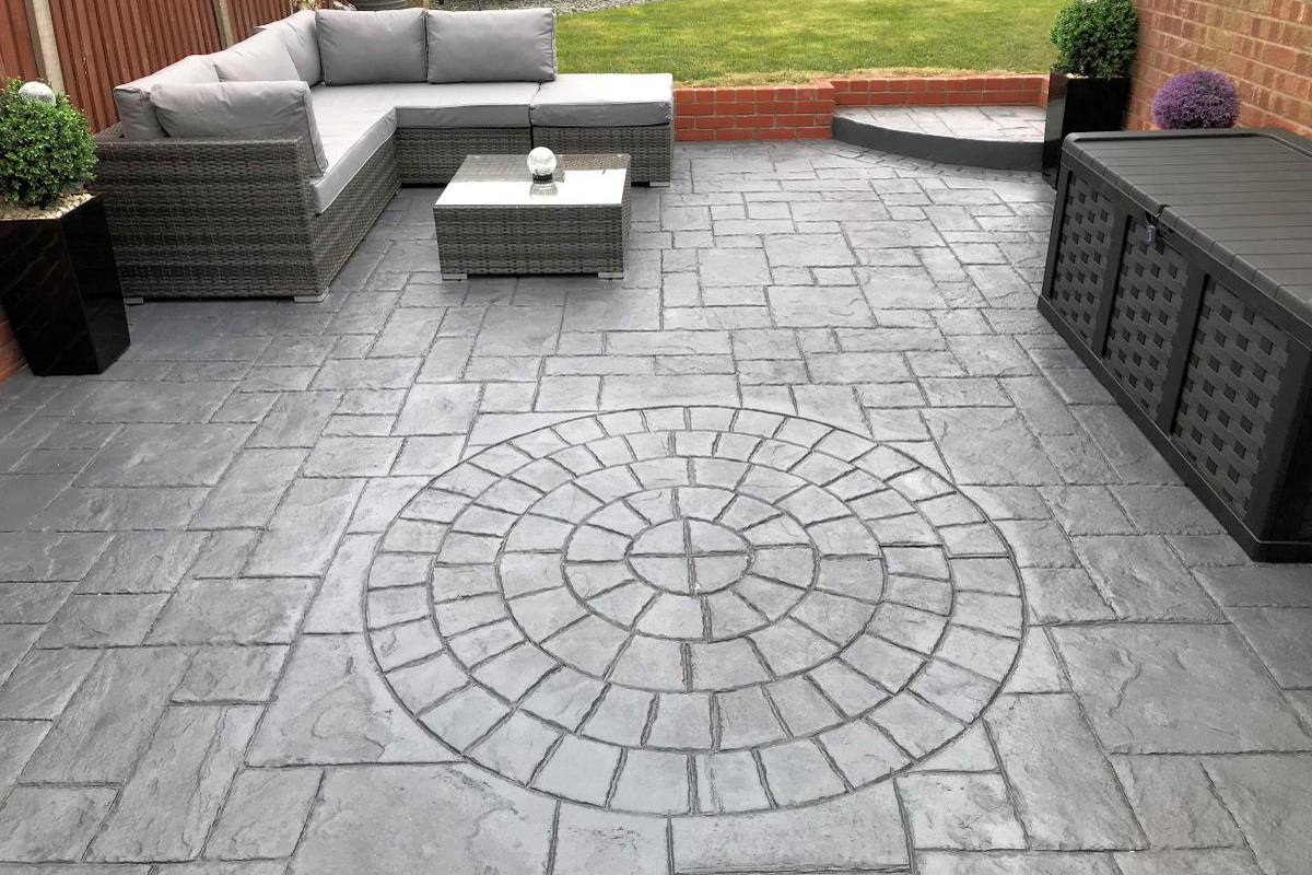 Pattern imprinted concrete driveway by Spot On Driveways