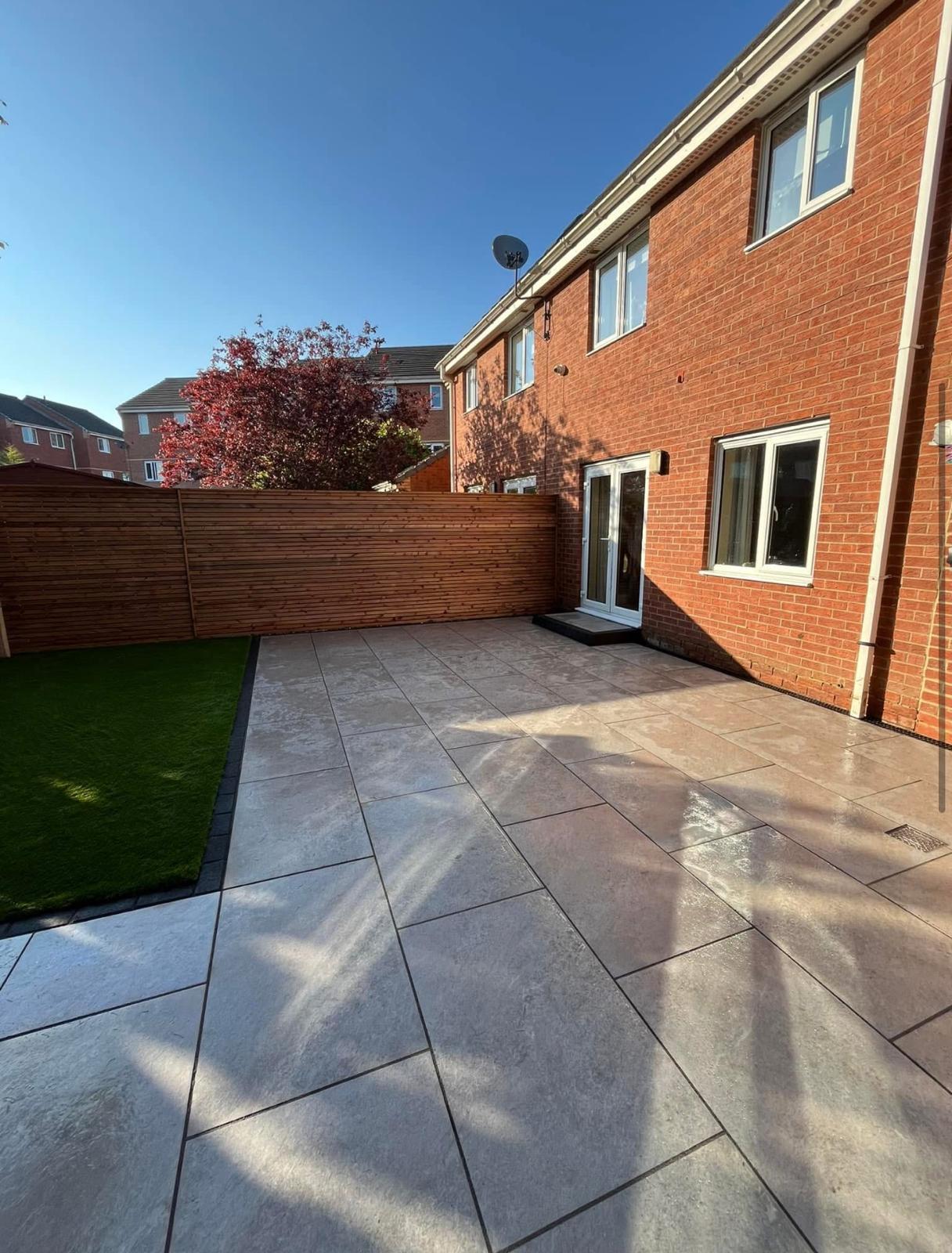 Porcelain patio with artificial lawn — Stockport